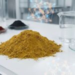 A detailed macro shot showing the manufacturing process of yellow iron oxide, with a vibrant mound of yellow pigment powder in a clean lab setting.